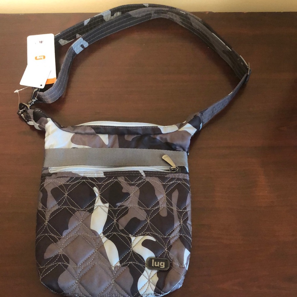 Lug crossbody purse brand new with tag
